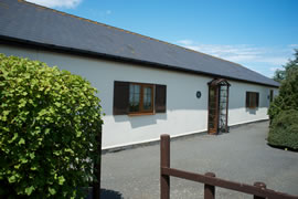 Rear view of cottages showing garden